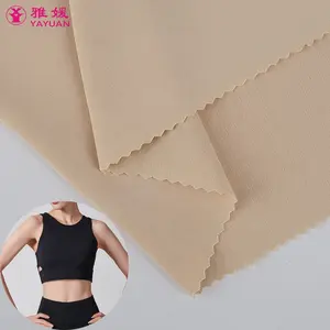 Pabrik Cina kualitas tinggi ramah lingkungan daur ulang 78 poliester 22 spandeks kain ketat untuk pakaian Yoga Shapwear