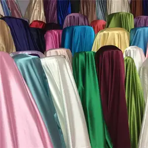 700 colores en stock 50D * 75D telas de satén de poliéster brillante sin estiramiento sensación de entrega suave para decoración tela de vestido de novia