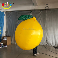 Support à jus accessoires de décoration modèle de fruit banane géante jaune gonflable avec logo
