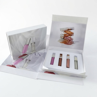 Ensemble d'emballages de luxe sur mesure pour gloss à lèvres blancs, boîte rigide pliable à fermeture magnétique avec insert personnalisé