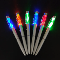 Stylo à DEL avec lumière lumineuse Écriture de nuit Décorations de fête clignotantes Stylo à bille pour écrivains de nuit