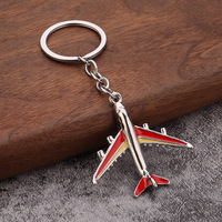 Porte-clés mousqueton en alliage de zinc, modèle d'avion de dessin animé tendance, avion de chasse, souvenir de compagnie aérienne, cadeau personnalisé avec logo pour porte-clés