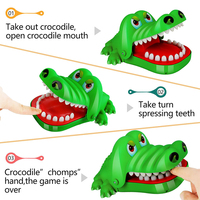 Roulette dentaire crocodile en gros avec dents en caoutchouc souple, jeu de morsure de main crocodile pour enfants, jouet de farce de table pour fête