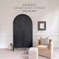 Armoire de rangement moderne en chêne massif noir cintrée, style luxe discret, pour chambre principale, villa, appartement ou projet.