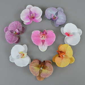 Orquídea Phalaenopsis de Dongchen Crafts, flor artificial de PVC de 11 cm de diámetro para tocados y decoraciones - Product Image 1