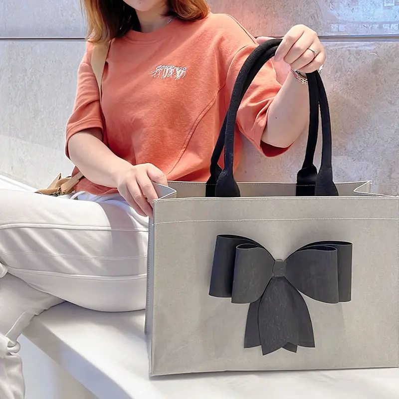 Benutzer definierte hochwertige Luxus wieder verwendbare recycelbare umwelt freundliche wasch bare Kraft papier Einkaufstasche Geschenk Einkaufstasche für Frauen