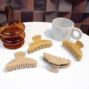 कैनोयुआन फैशन लकड़ी अनाज 10 सेमी आधा चंद्रमा एसीटेट बालों के पंजे क्लासिक बालों के सजे कस्टम थोक - Product Image 1