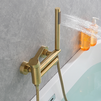 Robinet de baignoire sur pied en laiton avec douchette à main chromé pour salle de bain d'hôtel