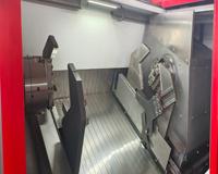 CNC1520 Perforación sincrónica opuesta para orificios internos de doble extremo mediante husillos gemelos, sin necesidad de torneado de la pieza.