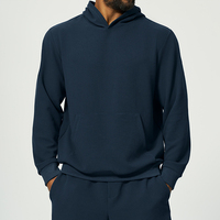 Sweat à capuche gaufré pour homme avec poche kangourou et poignets côtelés, pull décontracté d'automne, style urbain et extérieur, vente en gros personnalisée