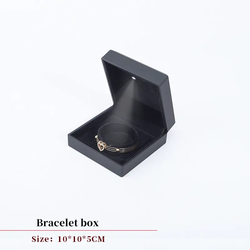 Venta al por mayor logotipo personalizado joyería terciopelo collar pulsera caja de embalaje con iluminación negro plástico LED pendientes anillo joyero