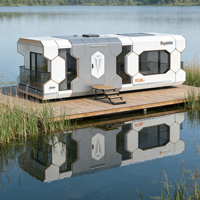 Maison capsule spatiale en acier au design moderne R38, cabine intelligente préfabriquée avec double balcon, alimentée à l'énergie solaire, pour usage familial, hôtelier ou bureautique
