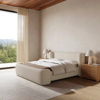 Lit plateforme capitonné Boucle avec tête de lit arrondie crème, base en plinthe de style organique moderne pour lits King et Queen, personnalisable OEM ODM