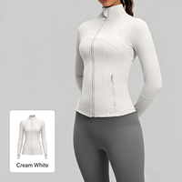 1. Veste de sport athlétique pour femme à séchage rapide, coupe ajustée, avec fermeture éclair intégrale, passe-pouces et poche zippée, idéale pour la course et l'entraînement