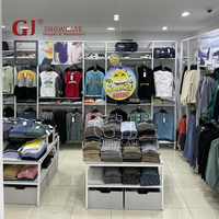 Meubles de boutique en vente chaude, magasin de vente au détail, rayonnage pour vêtements, magasin de vêtements, présentoirs pour t-shirts, design