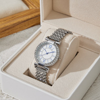Montre-bracelet à quartz pour femme, style influenceur TikTok, entièrement sertie de diamants, aiguille bleue, écologique, tendance