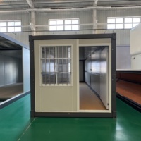 Maison conteneur à structure en acier robuste, cabine modulaire pliable durable, bureau mobile résistant aux intempéries pour la construction en extérieur