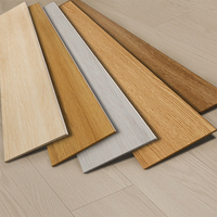 Vente chaude Carrelage en SPC imitation bois gris Carrelage en porcelaine Finition bois pour chambre à coucher Parquet en bois