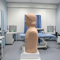 Simulateur médical automatique cardiopulmonaire pour l'entraînement à la palpation et à l'auscultation