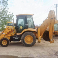 Chargeuse-pelleteuse d'occasion de 7,6 tonnes en stock avec godet frontal et bras d'excavation arrière pour une expédition rapide à l'exportation