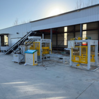 Machine de fabrication de blocs de briques de ciment QT4-16 automatique Machine de fabrication de briques de pavés à emboîtement creux en béton