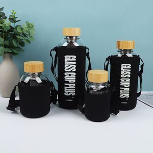 Portable Eco-friendly 18oz-64oz Leakproof Glass Water Bottle with Bamboo Lid Indoor/Outdoor <b>Drinkware</b> for Adults - Product Image 1