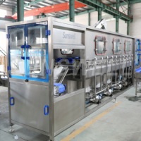 Machine industrielle automatique Sunswell pour le lavage, le remplissage et le bouchage de bouteilles de boissons de 5 gallons, avec moteur PLC, pompe électrique 220V/380V