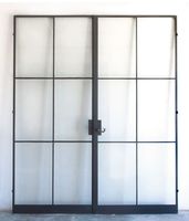 Porte d'entrée française en acier et verre ultra-étroite pour extérieur, avec isolation thermique, insonorisation, antivol, caractéristiques énergétiques et design minimaliste