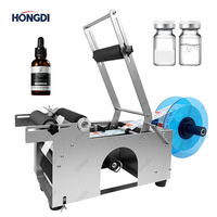 Machine d'étiquetage manuelle pour bouteilles rondes pour les petites entreprises, applicateur d'étiquettes pour bouteilles économique pour l'emballage
