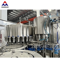 Machine de remplissage automatique 3-en-1 pour bouteilles PET de 2L, capacité 8000-10000 BPH, pour eau minérale pure et potable - Prix compétitif