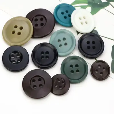 Factory wholesale resin pattern buttons four eyes mixed flower buttons coat resin bleach buttons