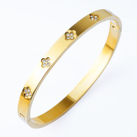Bracelet pour femme en acier inoxydable haut de gamme, plaqué or, serti de diamants, motif trèfle à quatre feuilles