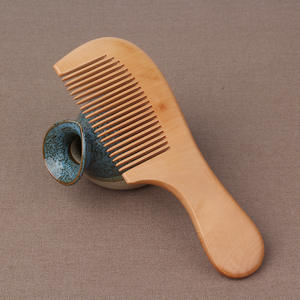 Peignes d'accouchement en bois Peigne d'accouchement et bébé - Product Image 1