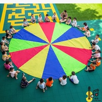 Kinder spielen Fallschirm für Teamwork GameTeam Building Aktivität Spiel Fallschirm Regenbogen spielen Fallschirm