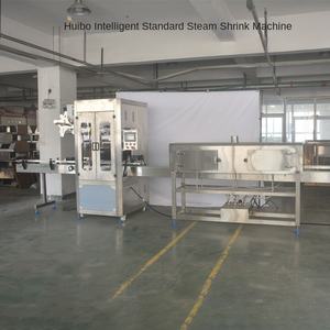 Juego de máquina etiquetadora de película termorretráctil automática de alta velocidad para latas Etiquetado de botellas de agua embotellada de bebidas de coco - Product Image 1