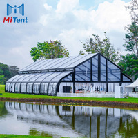 Tente de réception incurvée Atrium Miluxe Pro pour événements en plein air avec PVC transparent