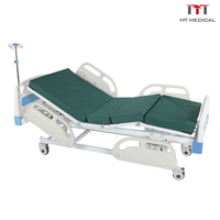 Lit médical manuel 3 fonctions économique MT avec têtes et pieds de lit en ABS et 4 barrières de sécurité