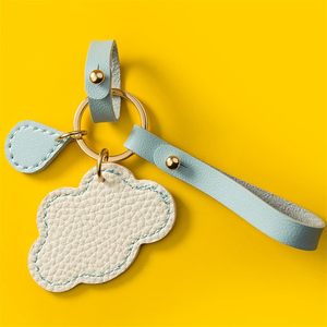 Portachiavi in pelle sintetica bianca e goccia di pioggia, accessori creativi per zaino portachiavi per auto