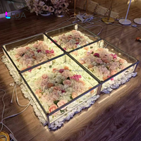 Scène de danse LED transparente pour mariage et événements, avec décor floral intégré