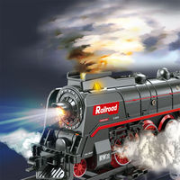 Nouveauté Creative DIY Assemblage En Plastique Fente À Vapeur Véhicule Ferroviaire Locomotive Modèle Électrique Musique Lumière Piste Fumée Train Jouet Ensemble