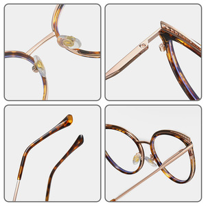 Montura de gafas ópticas de ojo de gato bicolor para mujer con protección contra la luz azul, patillas de metal con resorte, diseño ovalado y puente medio. - Product Image 3