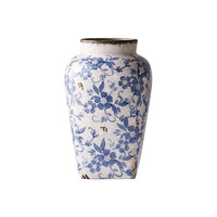 Vase en porcelaine bleu et blanc pour arrangement floral, décoration haut de gamme, style moderne minimaliste, design mid-century, en céramique pour table