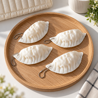 Porte-clés jouet sensoriel anti-stress en TPR blanc, forme dumpling, pour enfants et adolescents de 14 ans et plus, avec chaîne à perles