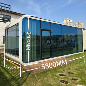 Módulo de Oficina Moderno en Contenedor, Diseño Rectangular, Exterior Blanco con Paneles Marrones y Ventanas de Vidrio para Uso en Exteriores - Product Image 2