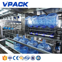 Machine de capsulage remplissante de baril de boisson en plastique PET automatique à grande vitesse de 5 gallons pompe à entraînement électrique eau pure de haute précision