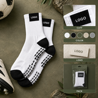 Chaussettes de football renforcées à logo blanc et noir, avec panneau de maintien, pour une adhérence optimale sur le terrain, profil mince, pour crampons, avec tableau des tailles, pour clubs