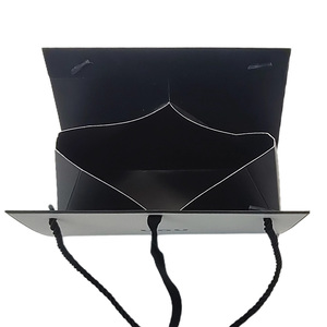 <strong>Custom</strong> Logo Eco-friendly Black White Foldable <strong>Paper</strong> Gift <strong>Bag</strong> Letter Pattern <strong>Design</strong> Digital Printing <strong>Custom</strong> High-End Candle Craft - Product Image 3