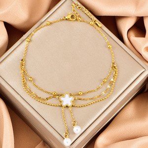 Nouvelle <span class=keywords><strong>Chaîne</strong></span> <span class=keywords><strong>de</strong></span> <span class=keywords><strong>Cheville</strong></span> Femme Tendance en Acier Inoxydable, Coquille Blanche, Fleur à Cinq Feuilles, Pompon et Perle, Triple Couche, Bijoux - Product Image 3