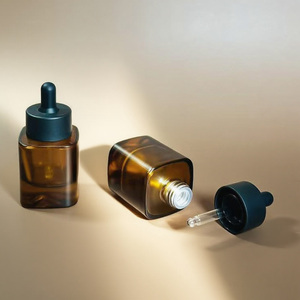 Eco Friendly Custom 30ml Amber Glass Dropper <b>Bottle</b> for Essential Oils with Unique Bottom Design - Product Image 3