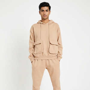 Vêtements à la mode Sweat à capuche et pantalon de survêtement avec poche cargo Ensemble de jogging 2 pièces Survêtements de rue pour femmes Sweats à capuche pour femmes - Product Image 1